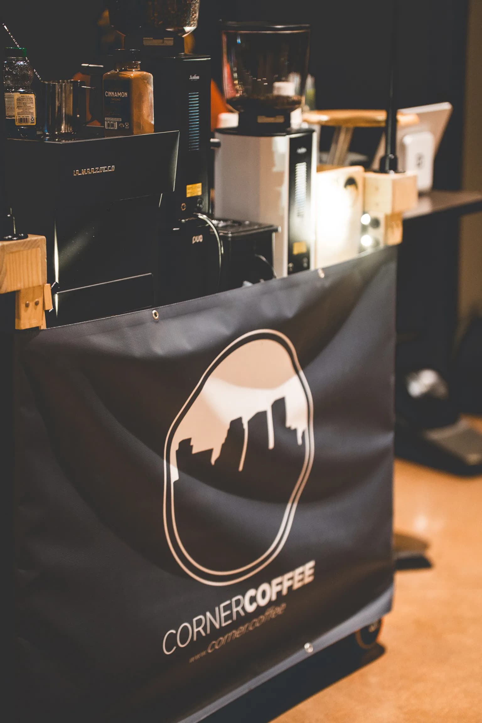 Corner Coffee mobile cart branding with espresso and grinding equipment ready for service