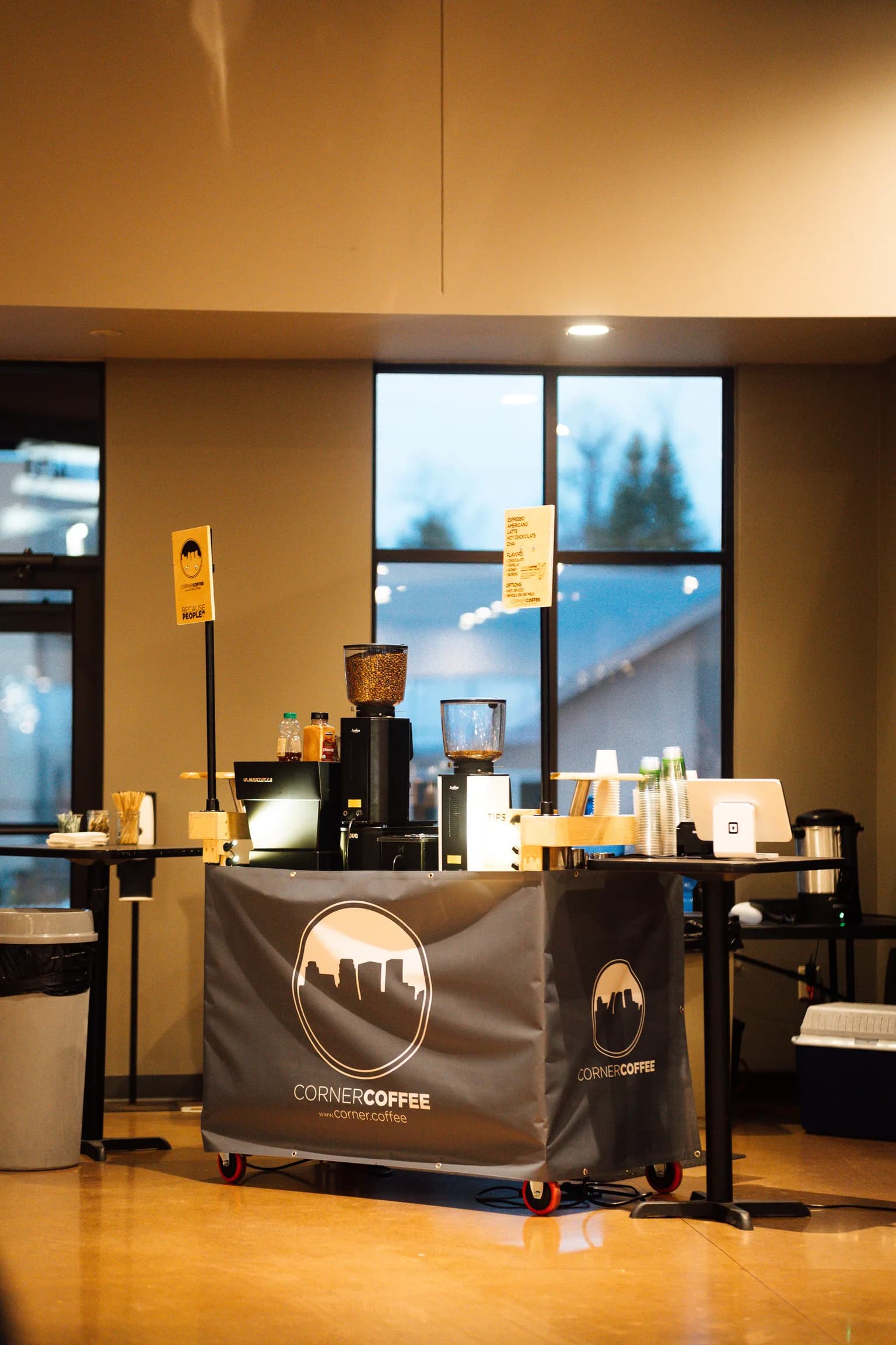 Corner Coffee mobile cart fully set up for service inside an event venue
