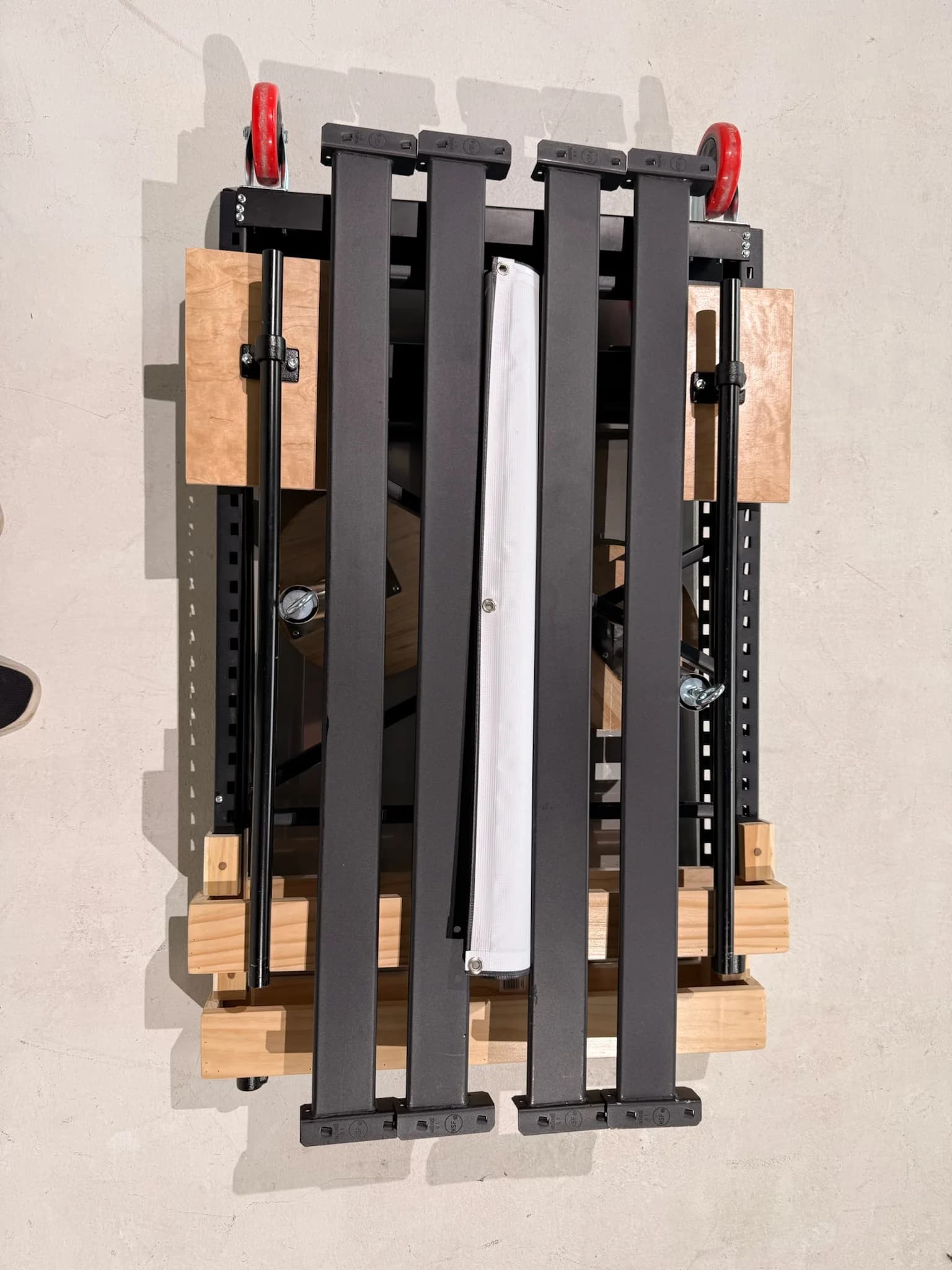 Overhead view of a custom Kinder Coffee Lab cart packed into its storage footprint